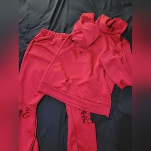 Distressed track suit